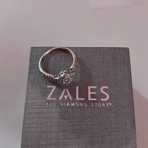 Engagement ring size 8 I bought it at Zales it is polished and clean - Picture 2 of 6